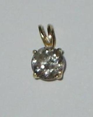 Appraisal: A SOLITAIRE DIAMOND PENDANT the old cushion cut stone approximately