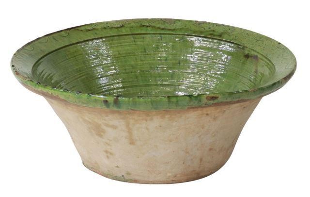 Appraisal: Large green Spanish terracotta bowl with glazed interior incised rim