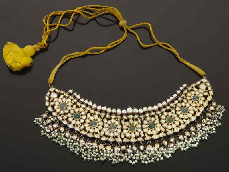 Appraisal: A Mughal-style gem-set enameled K gold necklaceset with emeralds diamonds