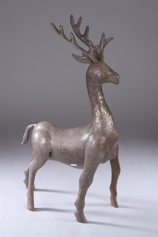 Appraisal: QAJAR STEEL FIGURE OF DEER Decorated in silver damascening with