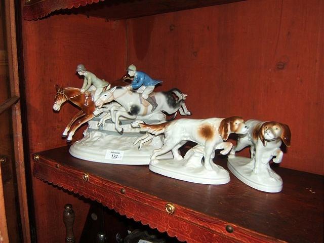 Appraisal: A Continental porcelain fox hunting figurine marked GDR together with