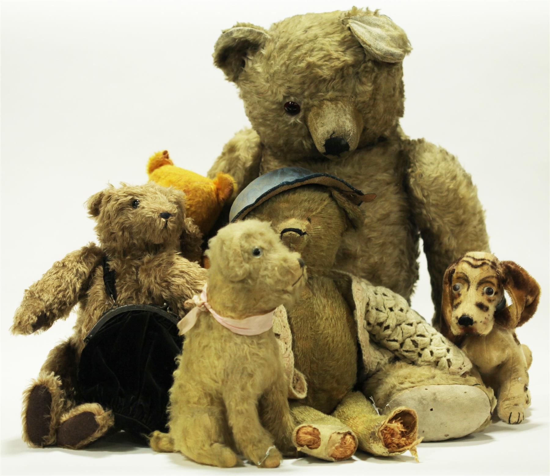 Appraisal: FOUR MOHAIR BEARS TWO DOGS American-German early to mid th