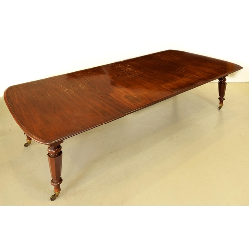 Appraisal: A Victorian mahogany dining table on tapered octagonal legs and