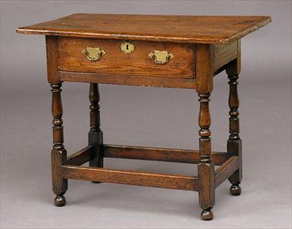 Appraisal: PROVINCIAL PINE SIDE TABLE The rectangular top above a frieze