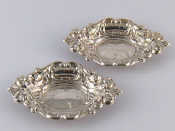 Appraisal: A pair of silver bonbon dishes x cm with display