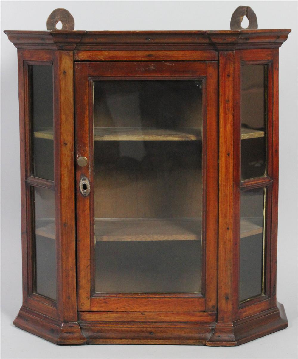 Appraisal: WALNUT HANGING WALL CUPBOARD having a rectangular top with a