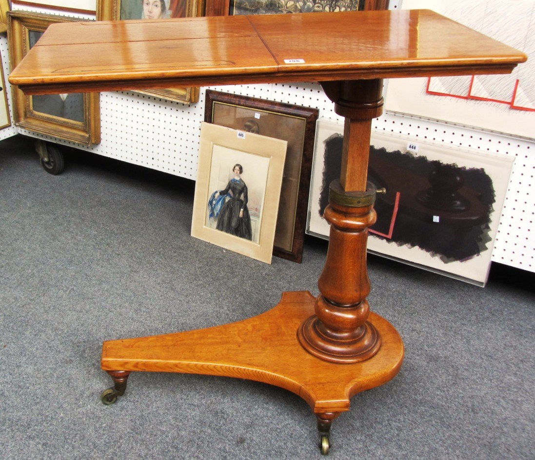 Appraisal: A Victorian oak height adjustable bed reading table cm wide