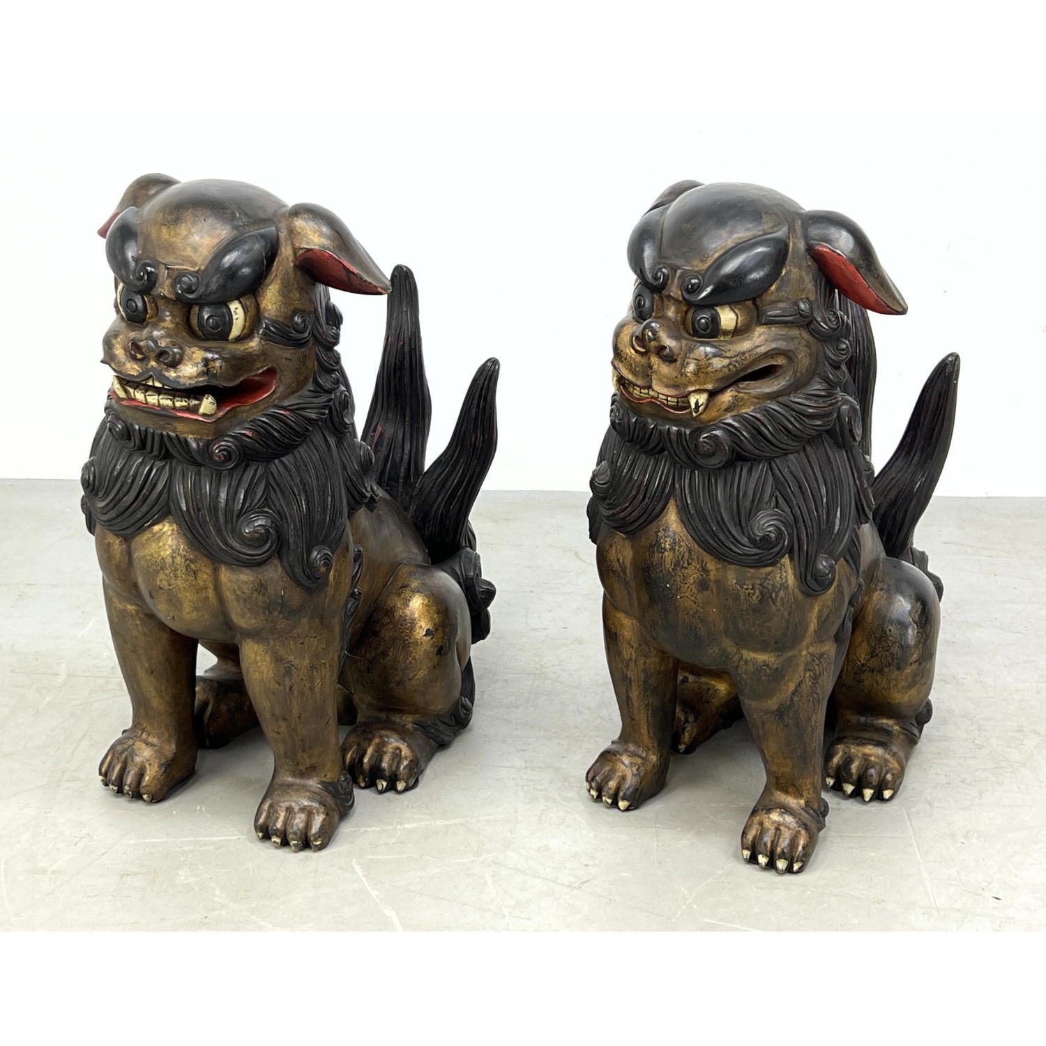 Appraisal: Pr Carved Wood Polychrome Foo Dogs Gilt Paint finish with