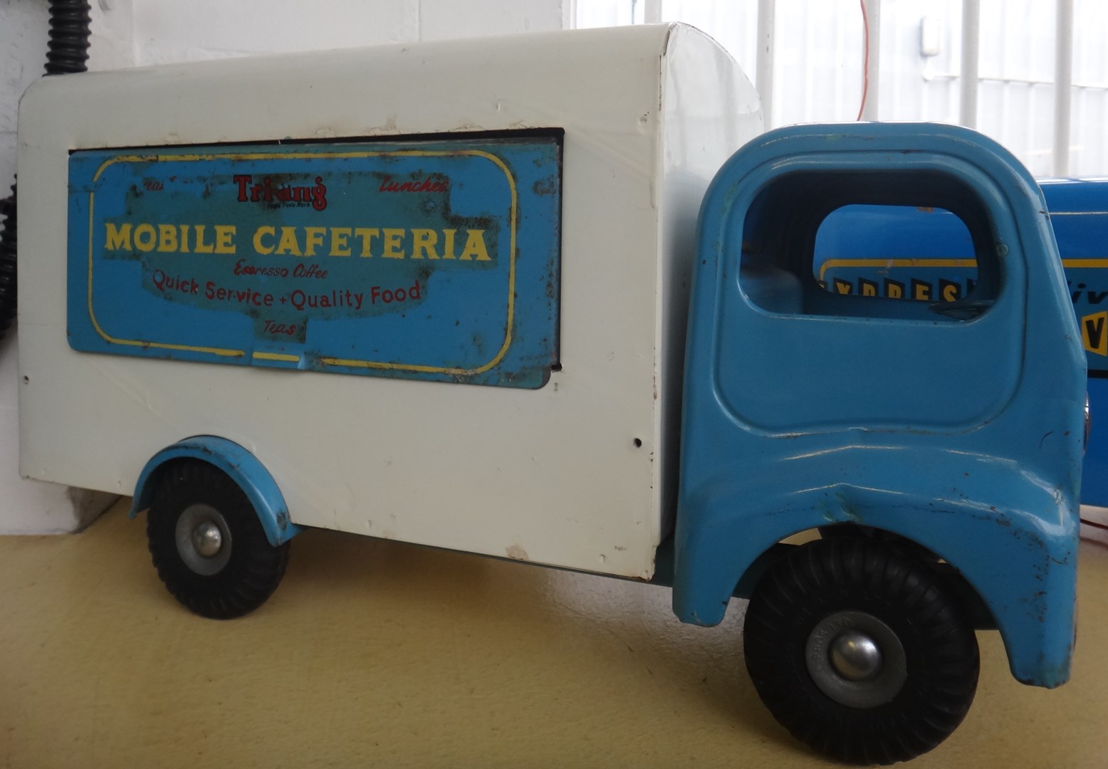 Appraisal: A Triang series mobile cafeteria with blue cab and opening