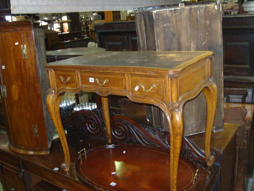 Appraisal: A th century continental oak side table with inset leather