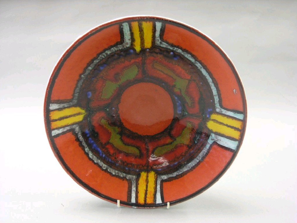 Appraisal: A Poole Pottery charger Delphis range glazed in vibrant colours