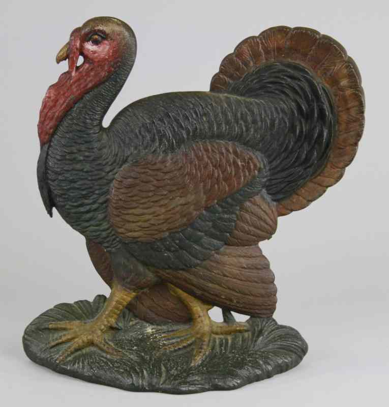 Appraisal: TURKEY DOORSTOP Robinson cast iron depicts cast iron wild turkey