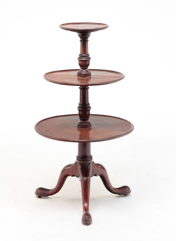 Appraisal: Mid th century mahogany Three graduated dishtop tiers that rotate