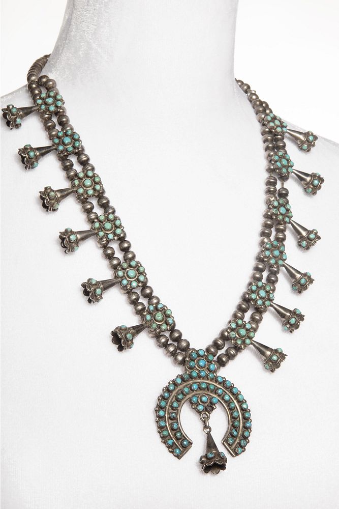 Appraisal: A Zuni Silver and Turquoise Squash Blossom Necklace and Earrings