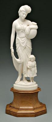 Appraisal: Indian ivory carving woman and child the woman holding a