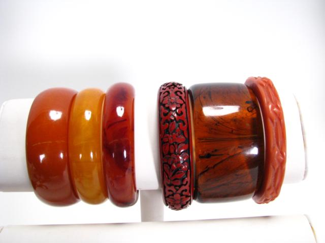 Appraisal: Collection of six vintage bakelite and plastic bangle bracelets all