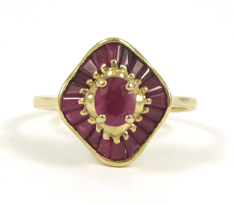 Appraisal: RUBY AND FOURTEEN KARAT GOLD RING The yellow gold ballerina