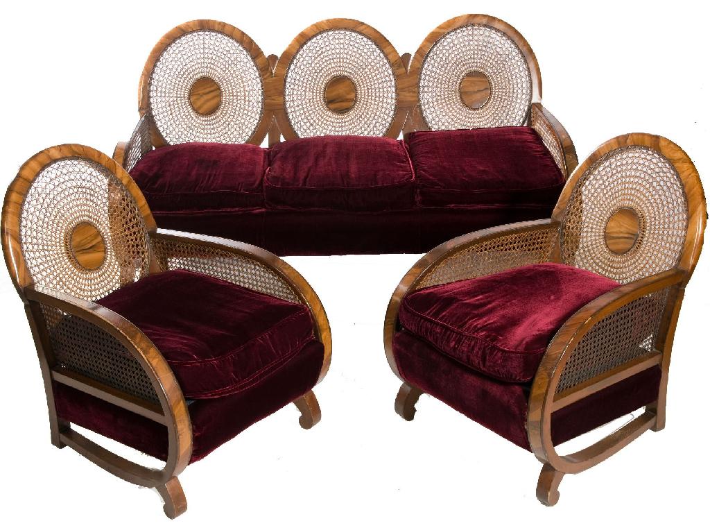 Appraisal: ART DECO WALNUT BERGERE SITTING ROOM SUITE comprising a triple-arched