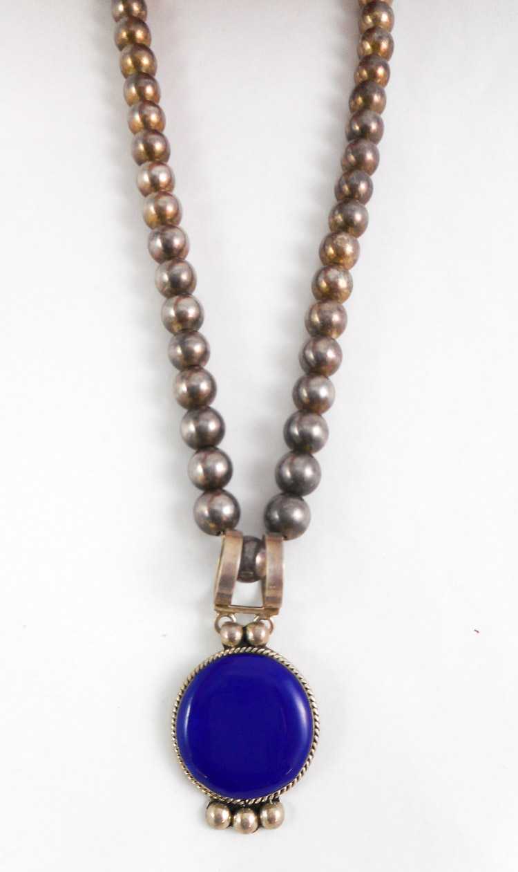 Appraisal: MEXICAN STERLING SILVER BEADED NECKLACE with round cobalt blue cabochon