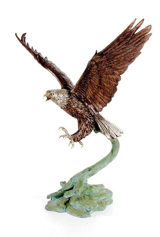 Appraisal: Continental school th century HUNTING EAGLE patinated and silver-gilt bronze