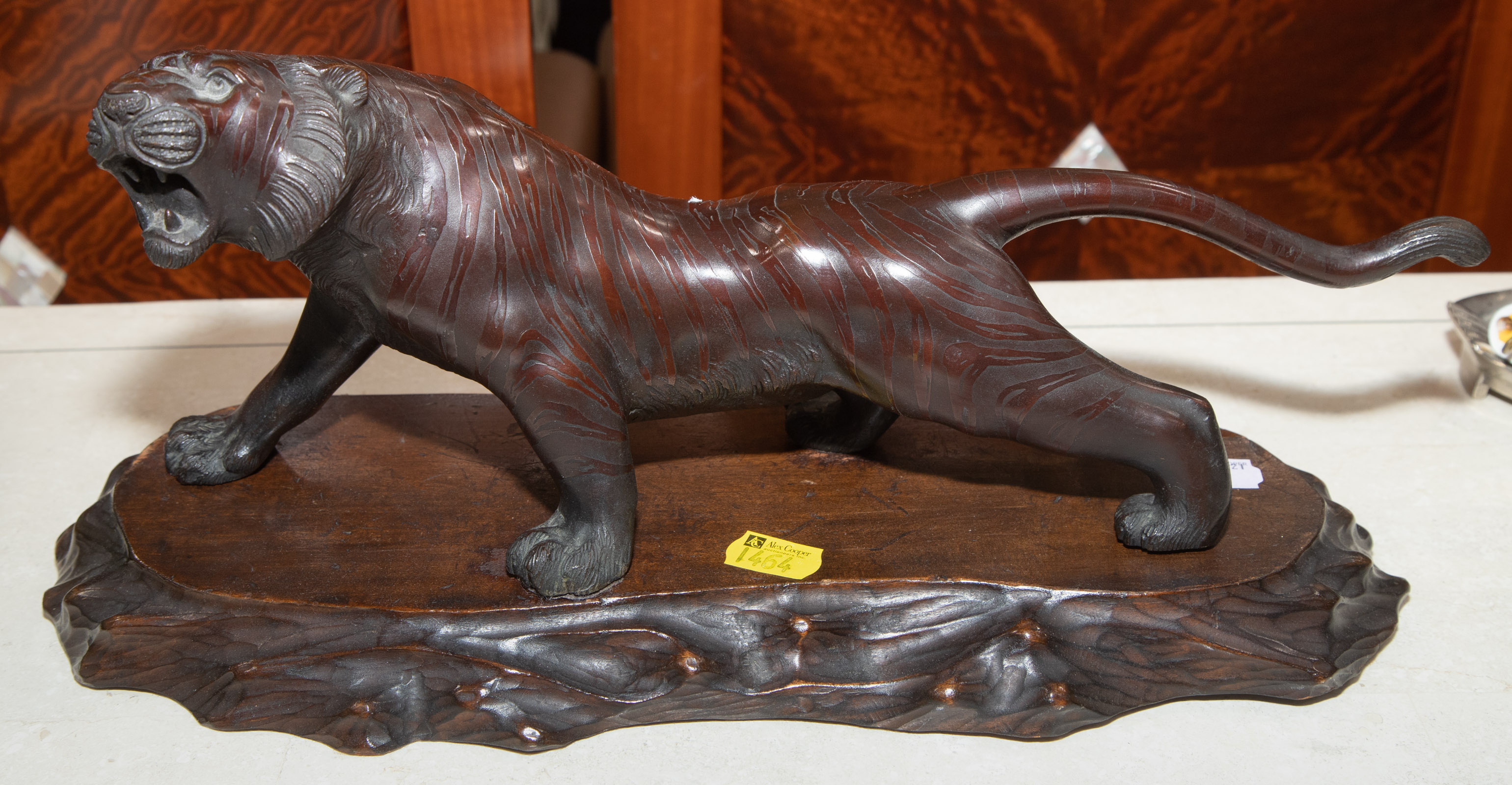 Appraisal: JAPANESE BRONZE TIGER ON STAND Early th century makers mark