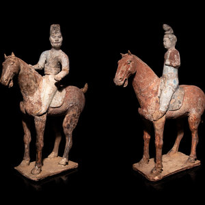 Appraisal: A Pair of Chinese Pottery Equestrian Figures Possibly Tang Dynasty