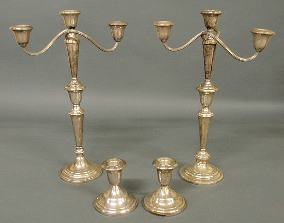 Appraisal: Pair of weighted sterling silver candelabra h and a pair