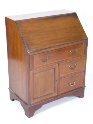 Appraisal: An Edwardian mahogany bureau the fall front with fitted interior