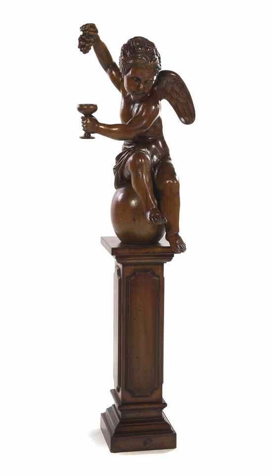 Appraisal: A Continental Carved Pine Figure in the form of a