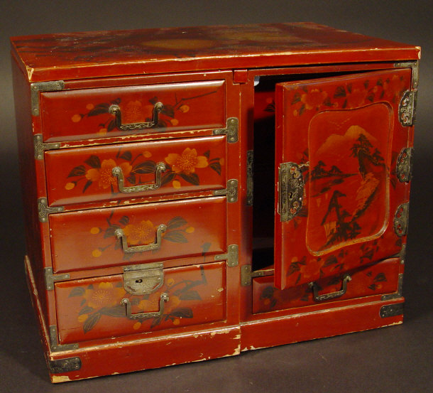 Appraisal: Japanese red lacquer collapsable collectors cabinet with chased metal mounts