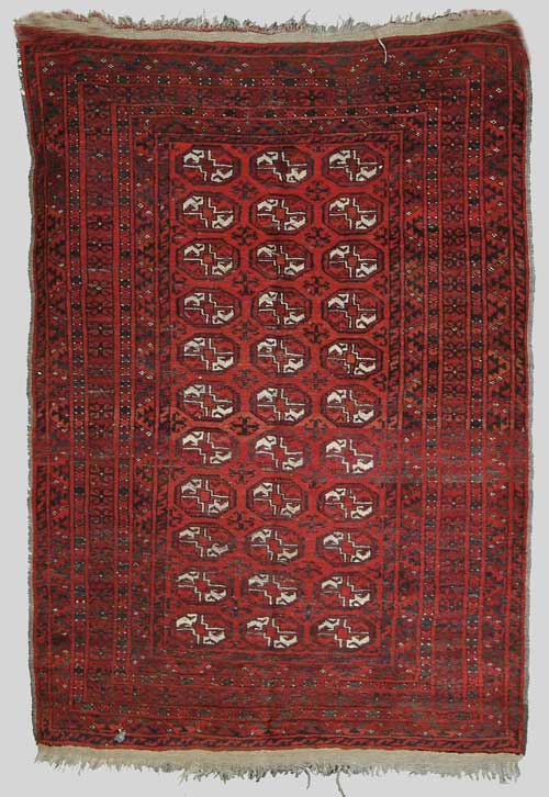 Appraisal: BOKARA ORIENTAL RUG Three columns of eleven octagon medallions surrounded