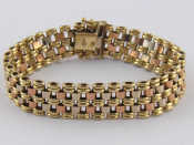 Appraisal: A three colour carat gold bracelet approx cm long mm