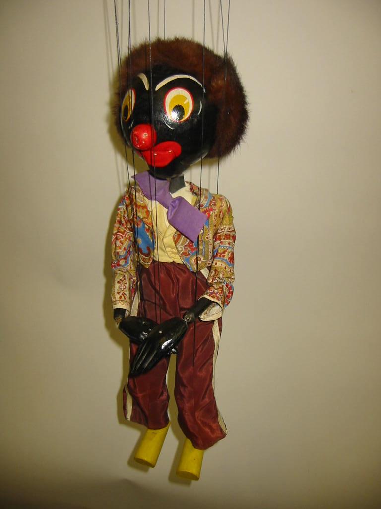 Appraisal: A large Pelham puppet SS Golliwog high in brown standard