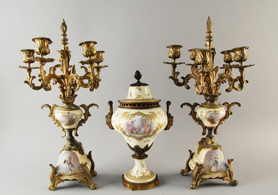 Appraisal: An Ormolu Mounted Porcelain Garniture a lidded decorative urn and