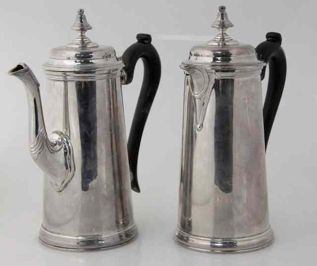 Appraisal: A silver coffee pot and hot water jug J Son