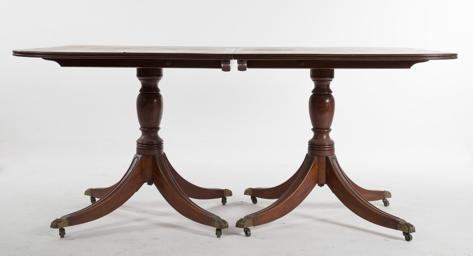 Appraisal: Mahogany dining table with one extension leaf