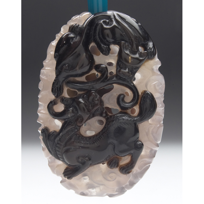 Appraisal: Chinese pendant th century hollowed and carved quartz with applied