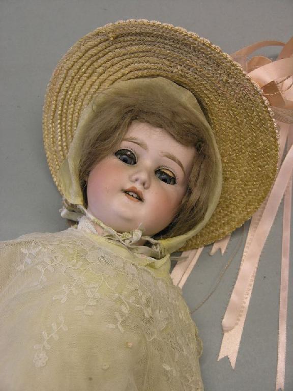 Appraisal: An early th century German bisque doll with sleeping eyes