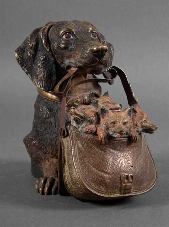 Appraisal: Austrian cold painted bronze figural inkwell of a dachshund holding