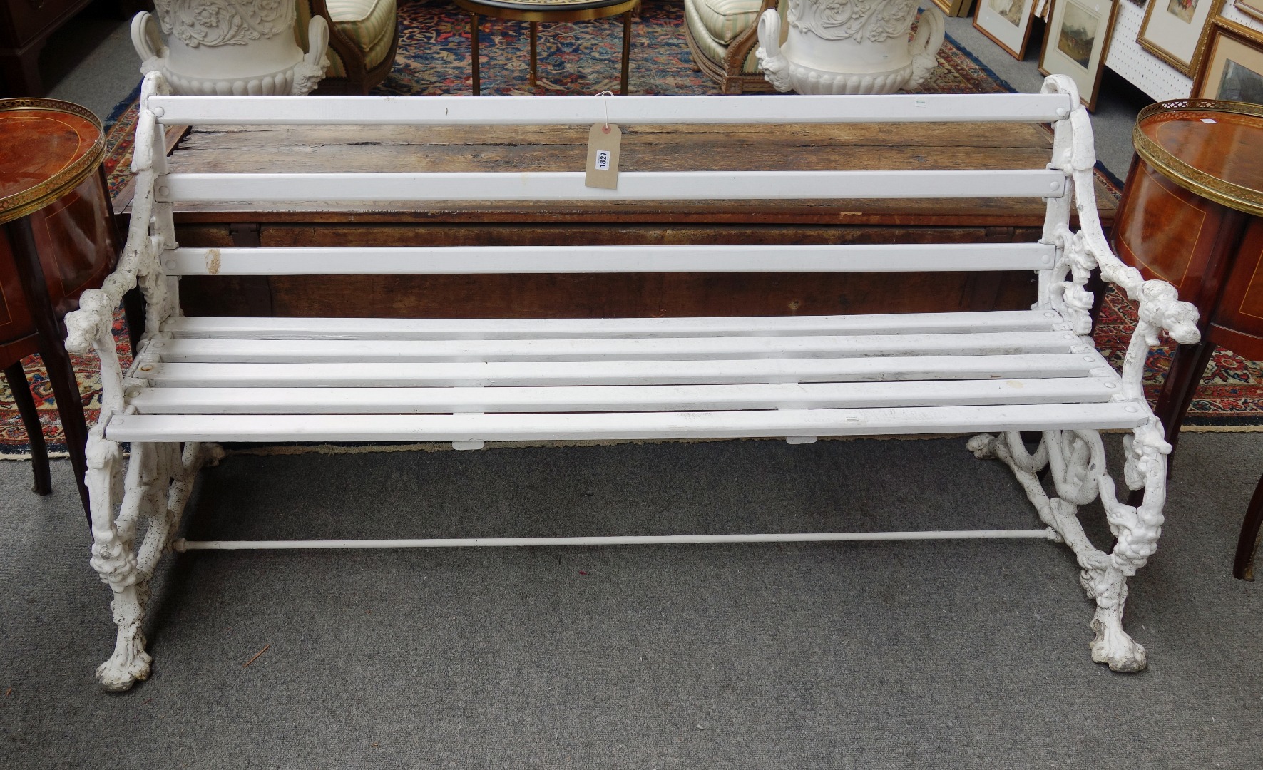 Appraisal: A th century white painted cast aluminium garden bench with