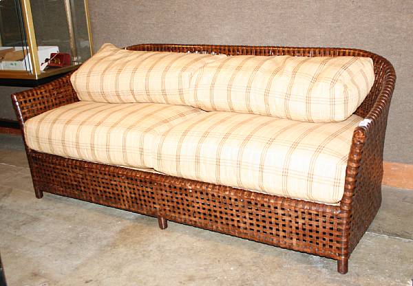 Appraisal: A laced rawhide 'Antalya' sofa McGuire Furniture Company st century