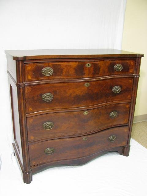 Appraisal: Mid th century English chest of drawers with serpentine front