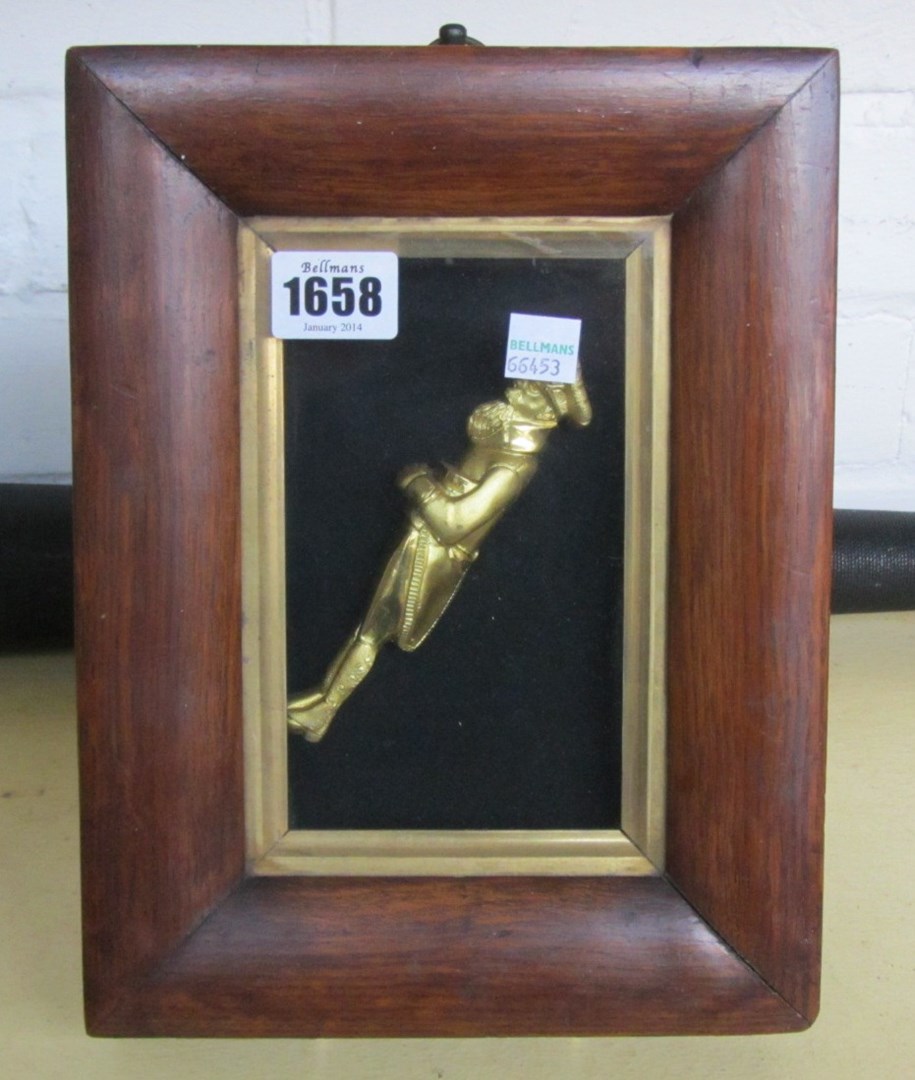 Appraisal: A gilt metal cast of a sailor in a mahogany