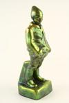 Appraisal: ZSOLNAY - Circa s Zsolnay art pottery figure Boy wearing