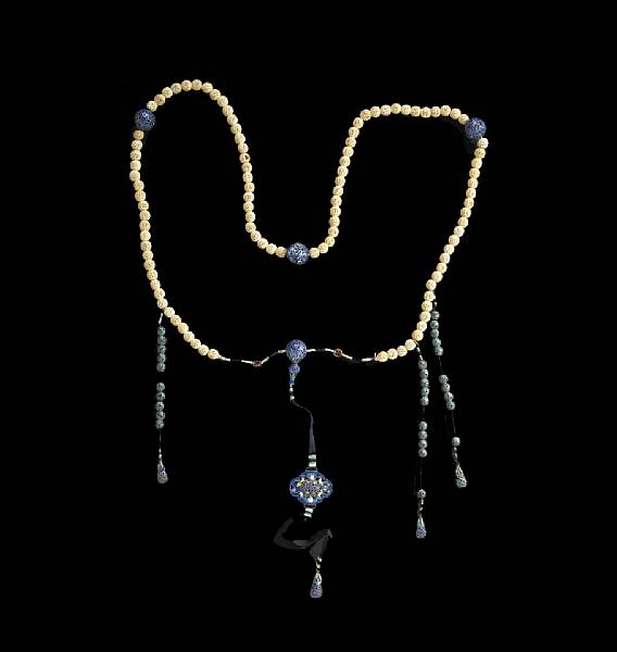 Appraisal: A reticulated ivory bead and enameled silver partial court necklace