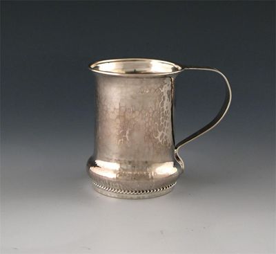 Appraisal: By A E Jones an Arts and Crafts silver mug