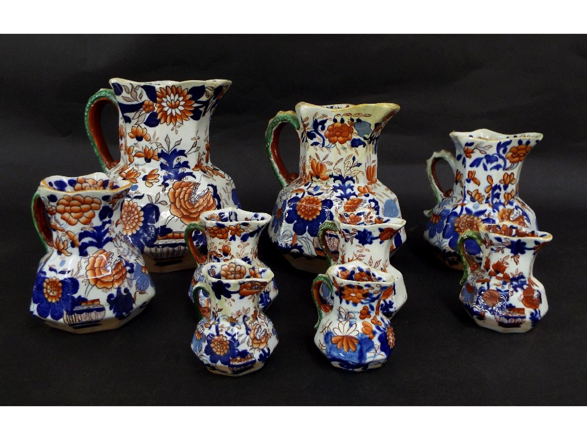 Appraisal: Nine assorted Masons Ironstone graduated jugs decorated in the 'Japan'