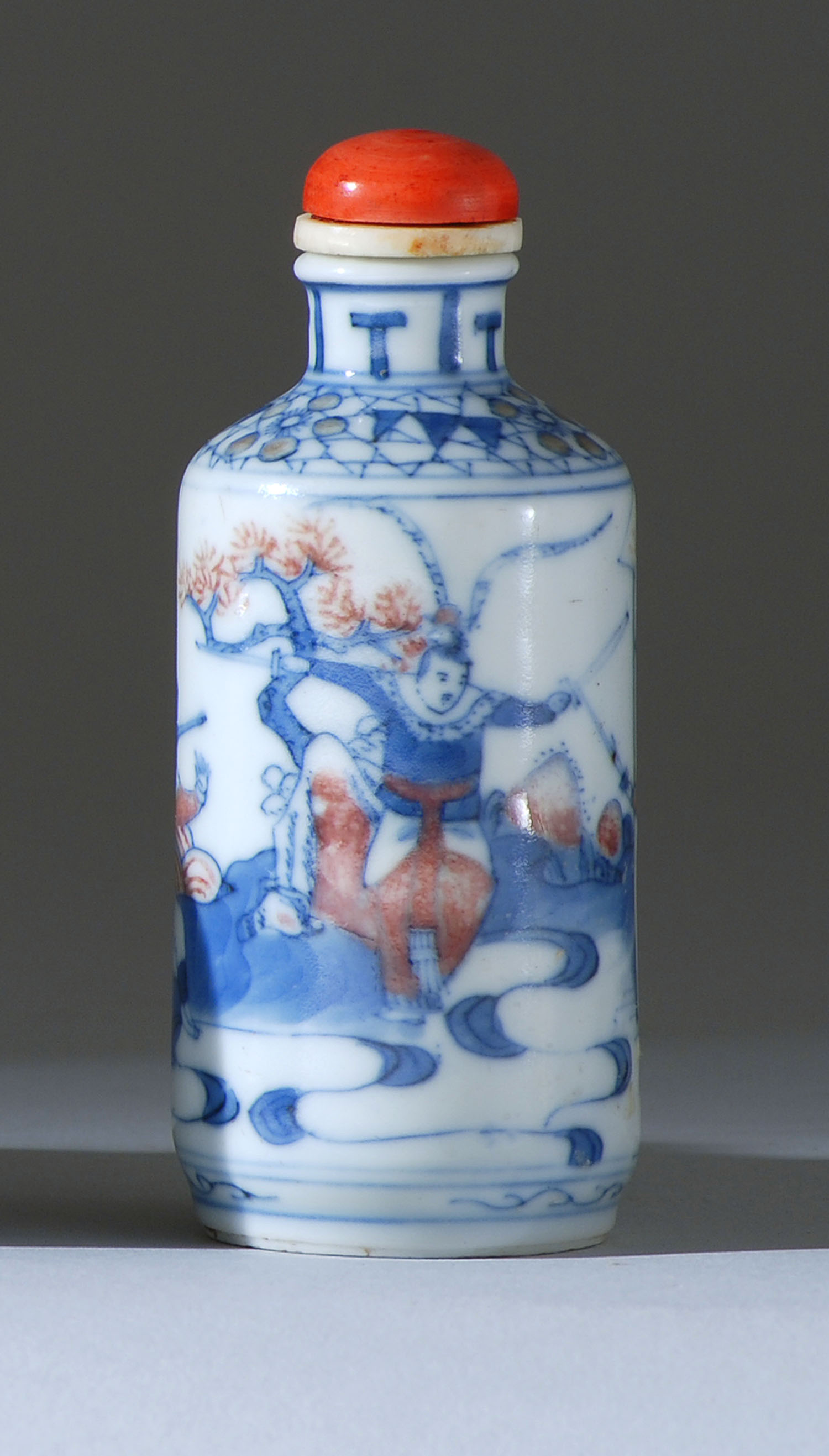 Appraisal: UNDERGLAZE RED AND BLUE PORCELAIN SNUFF BOTTLE th CenturyIn cylinder