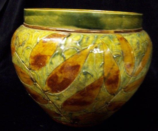 Appraisal: A Doulton Lambeth vase of ovoid form decorated leaves cm