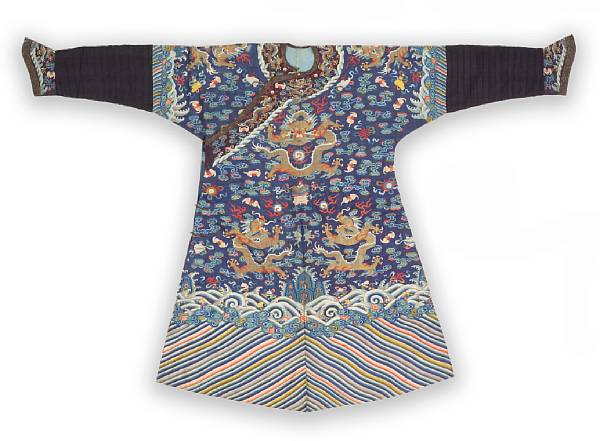 Appraisal: A dark blue ground kesi-woven dragon robe th Century Its